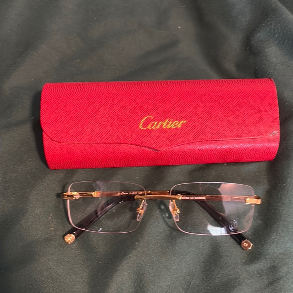 Cartier Gold and Black Rimless Glasses